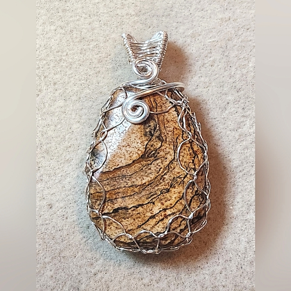 Viking knit wire-wrapped Picture Jasper with wire woven bail.